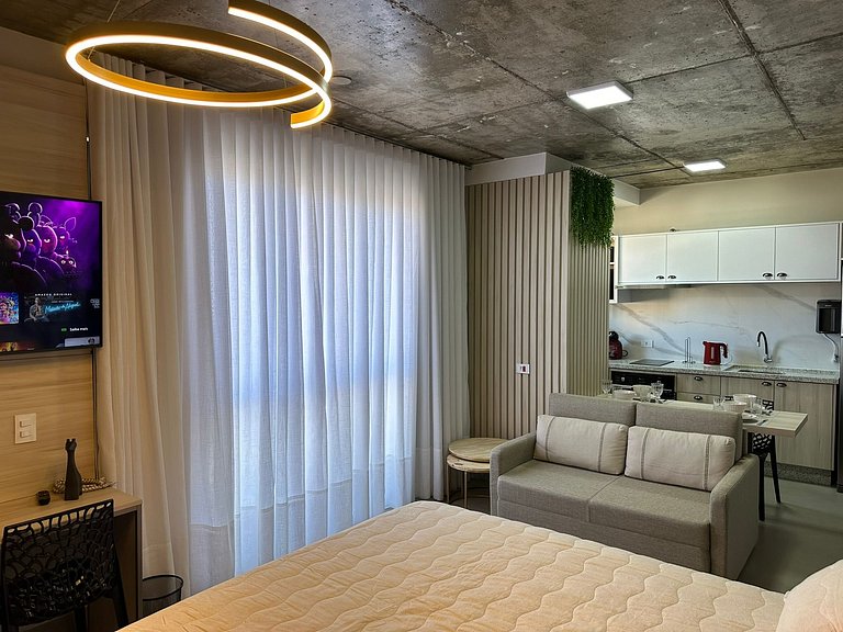 Studio 1502 com sacada, garagem e A/C