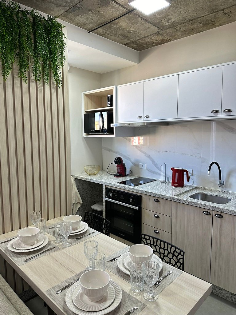 Studio 1502 com sacada, garagem e A/C