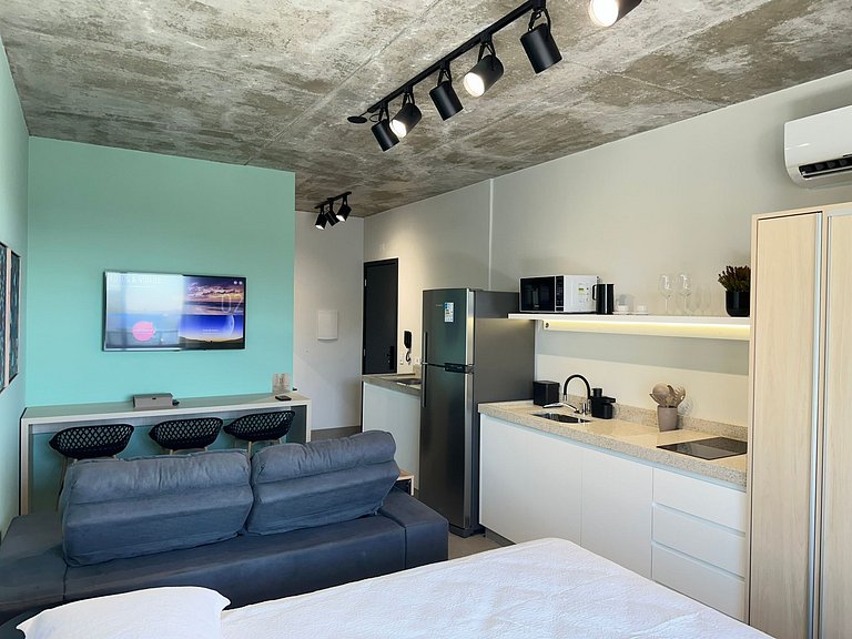 Studio 1301 com sacada, garagem e A/C