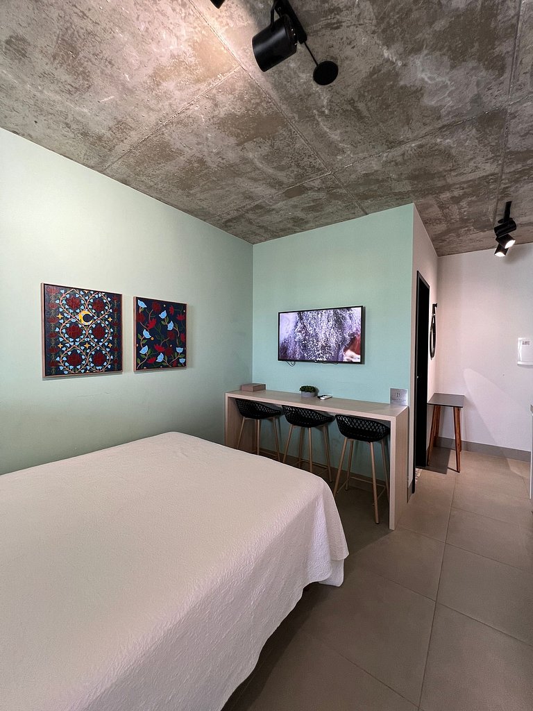 Studio 1301 com sacada, garagem e A/C