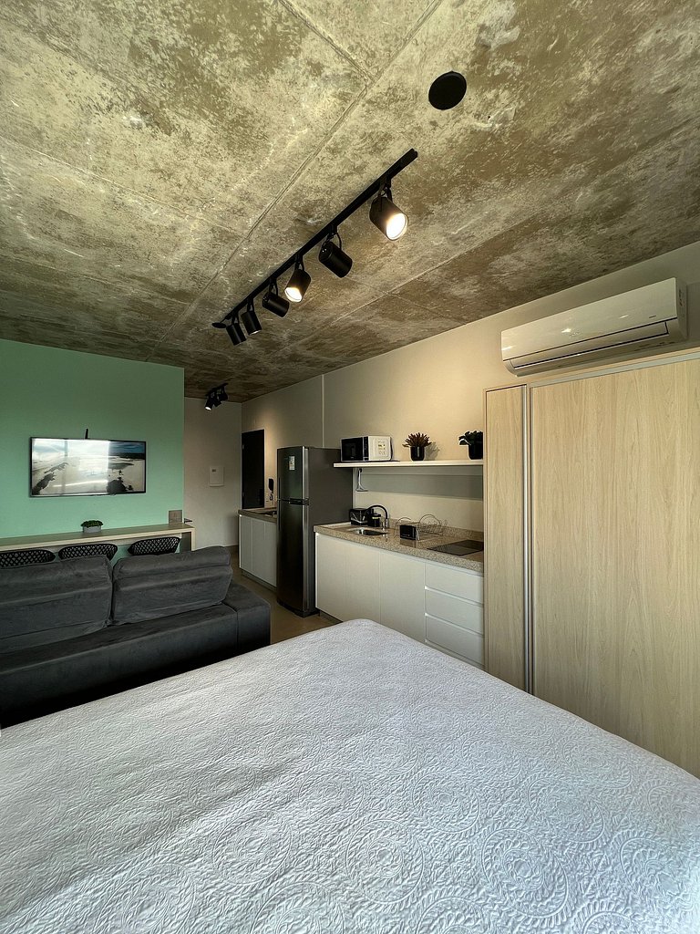 Studio 1301 com sacada, garagem e A/C