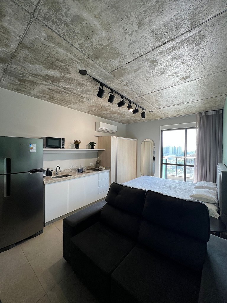 Studio 1301 com sacada, garagem e A/C