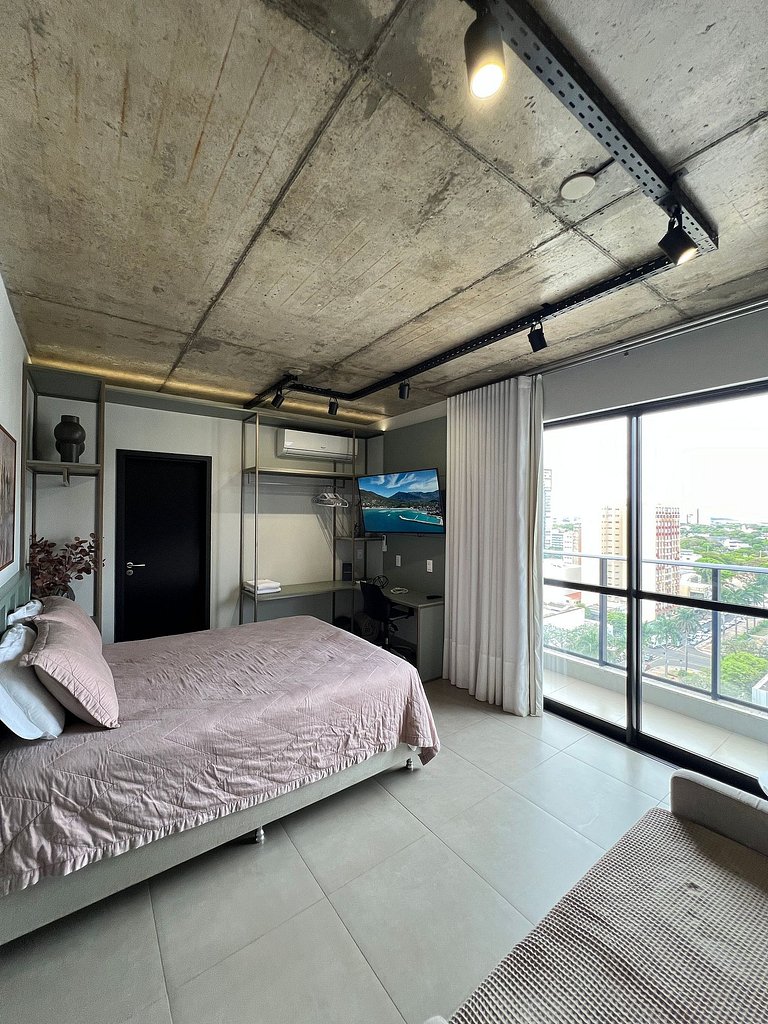 Studio 1402 com sacada, garagem e A/C