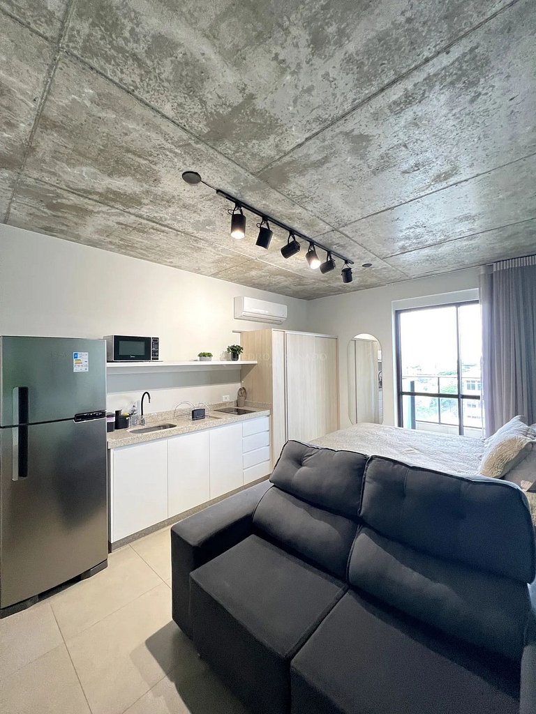 Studio 1301 com sacada, garagem e A/C
