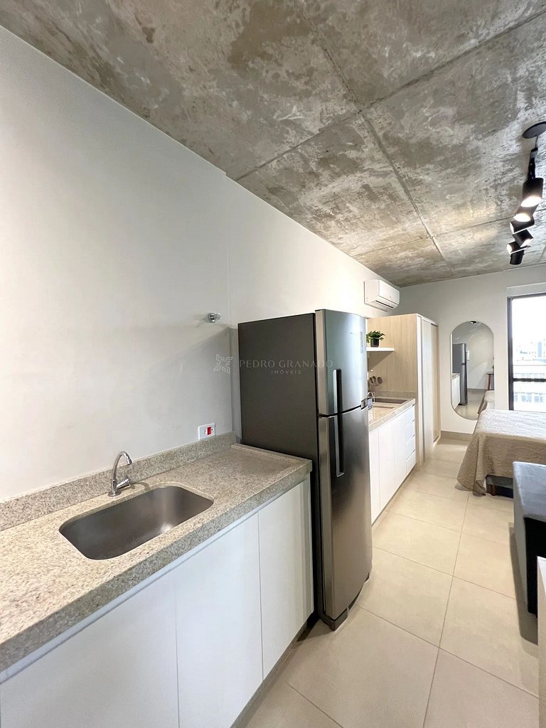 Studio 1301 com sacada, garagem e A/C
