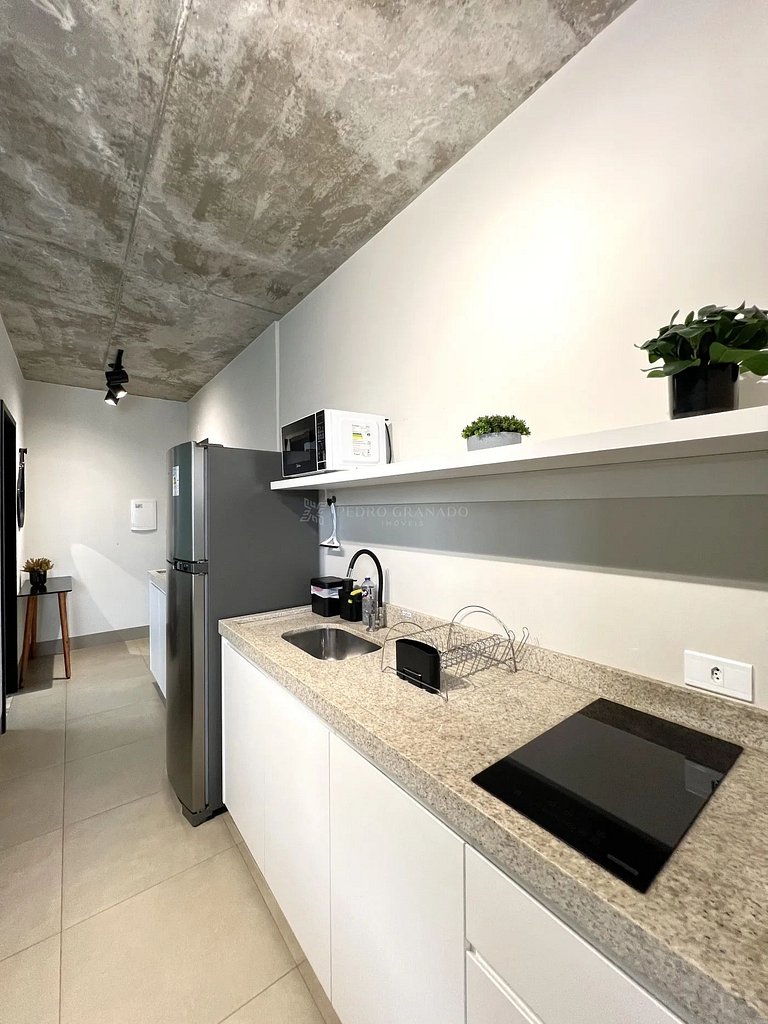 Studio 1301 com sacada, garagem e A/C